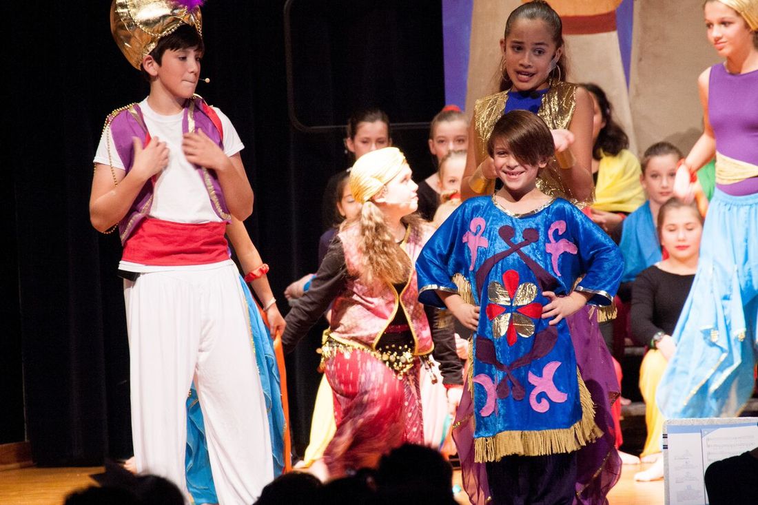 Aladdin and Magic Carpet on stage.